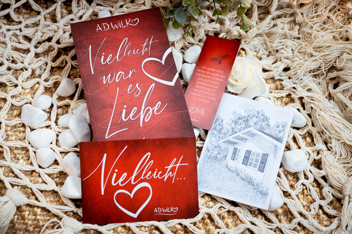 Taschenbuch »Vielleicht war es Liebe« von A.D. WiLK, in Szene gesetzt.